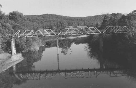 h01214 genoa river timber and concrete bridge b w photo