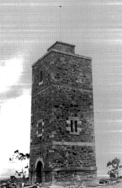 68 - War Memorial and Components Eltham Yarra Gl Rd - Old photograph taken after the completion of the tower, but prior to the installation of the main metal plaque fixed above the arch ELHPC no.406 - Shire of Eltham Heritage Study 1992