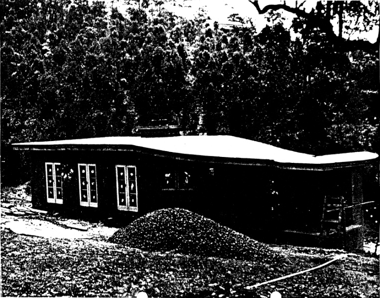 261 - The Busst House Eltham 04 - South elevation photographed during construction - Note the curved eastern end and roof following the descent of the stair within - Shire of Eltham Heritage Study 1992