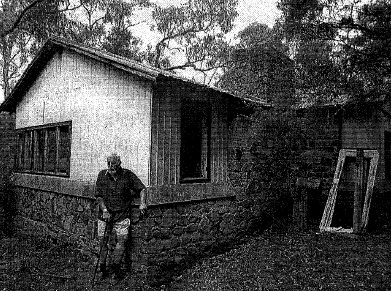 HO205 - Three Bears cottage - View from west, with. historian Mick Wolwod