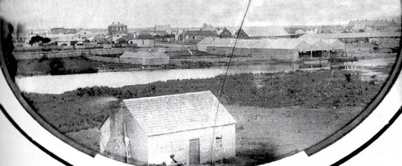 Ca. 1861 photograph of Port fairy facing NNW across the Moyne showing Rutledge's wharf and stores on western bank