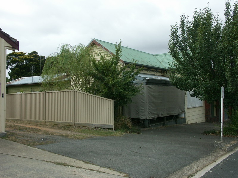 House (Former Service Station)