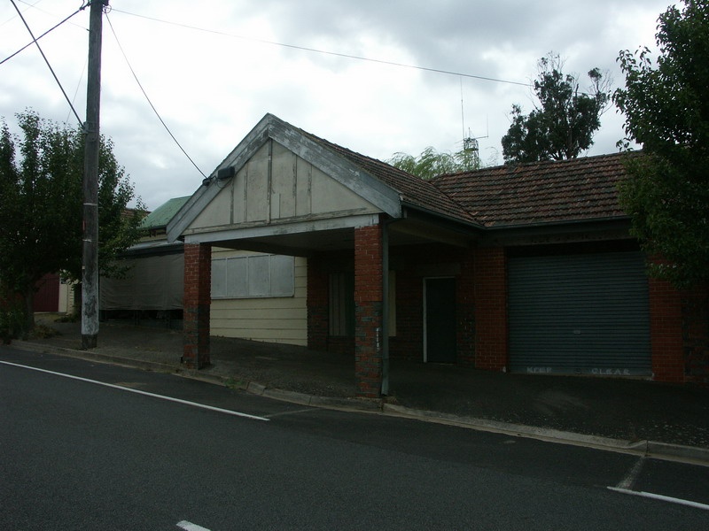 House (Former Service Station)