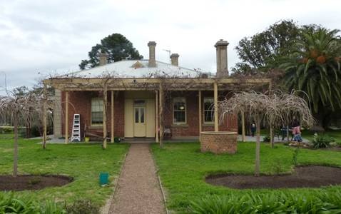 Rear elevation, note plantings at right.