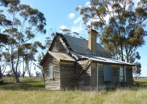 North and west elevations, note sugar gums at rear.