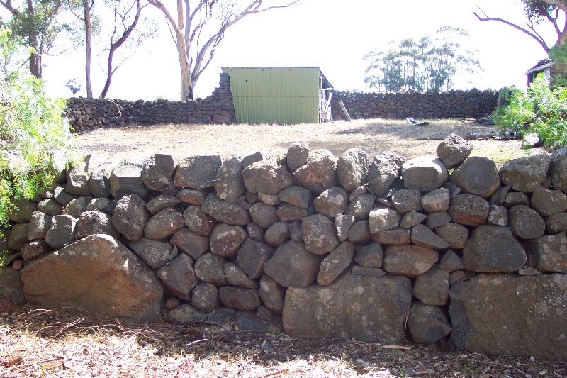 Dry stone wall stock yard