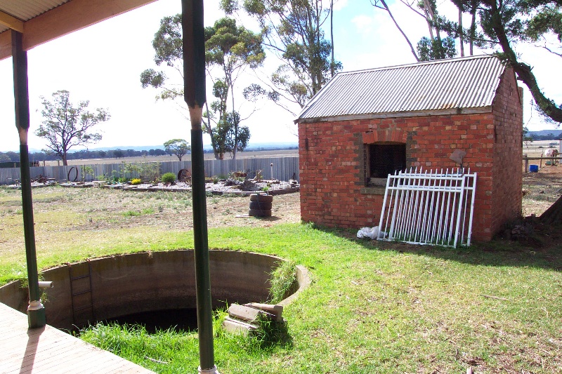 Well and laundry outbuilding