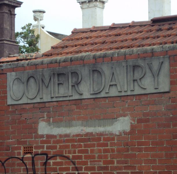 Detail of early signage on the former dairy