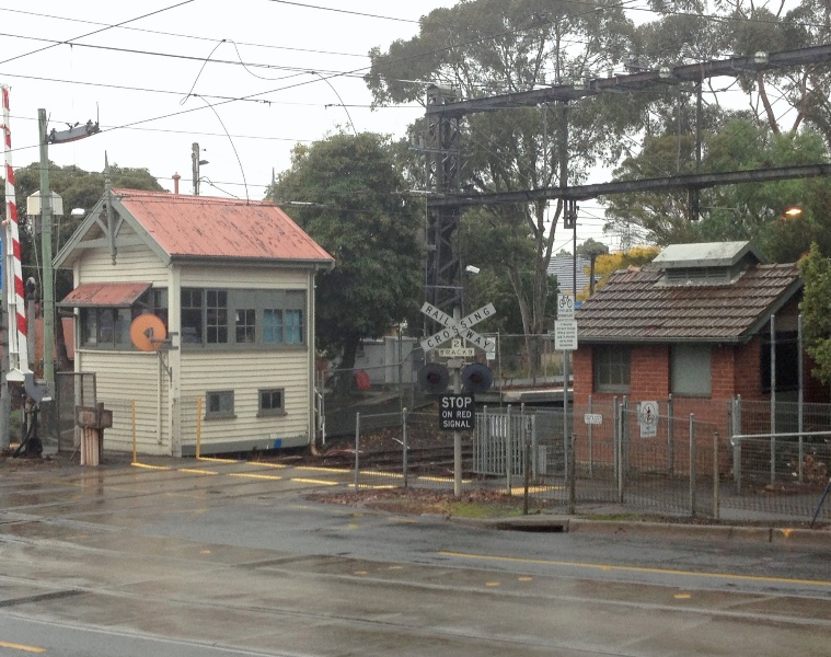 Kooyong railway signal box (left) and switch house (right).