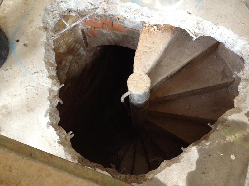 spiral stairway from hub to kitchen below.jpg