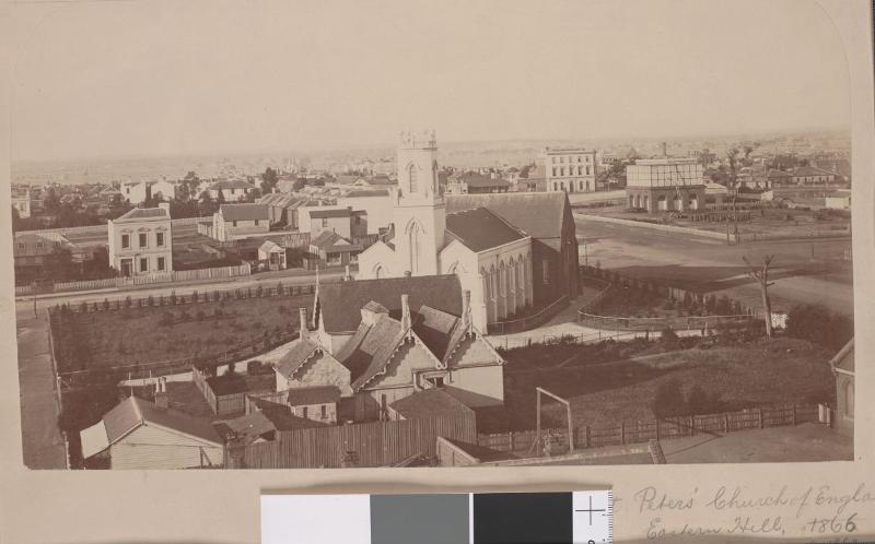 St Peters with water tank in background 1866.JPG