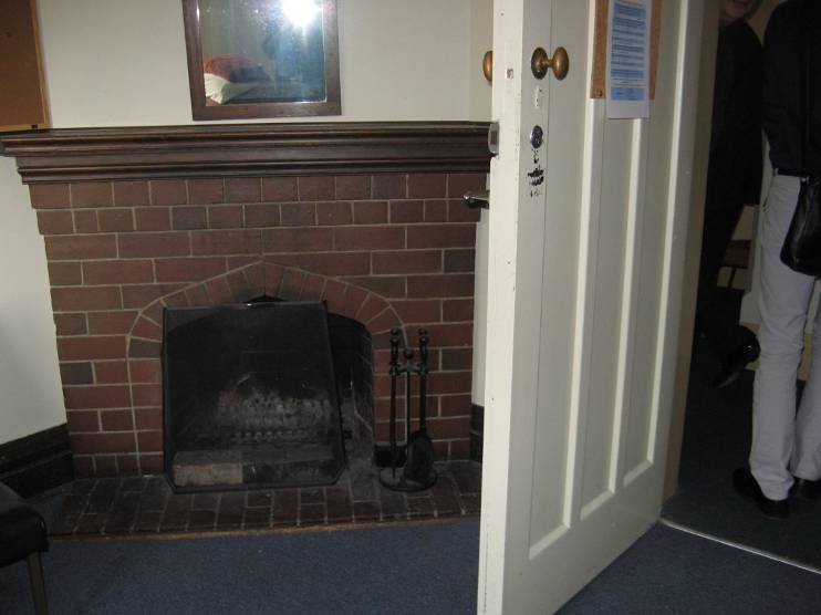 Fireplace in a student room of the 1930 Traill Wing