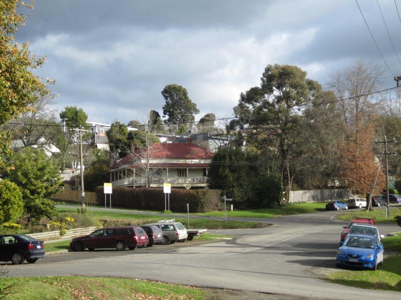 Intersection of Symons St and Crowley Road, Green Street, looking south- west. 28 Symons St (significant ) is prominently sited at centre of image.