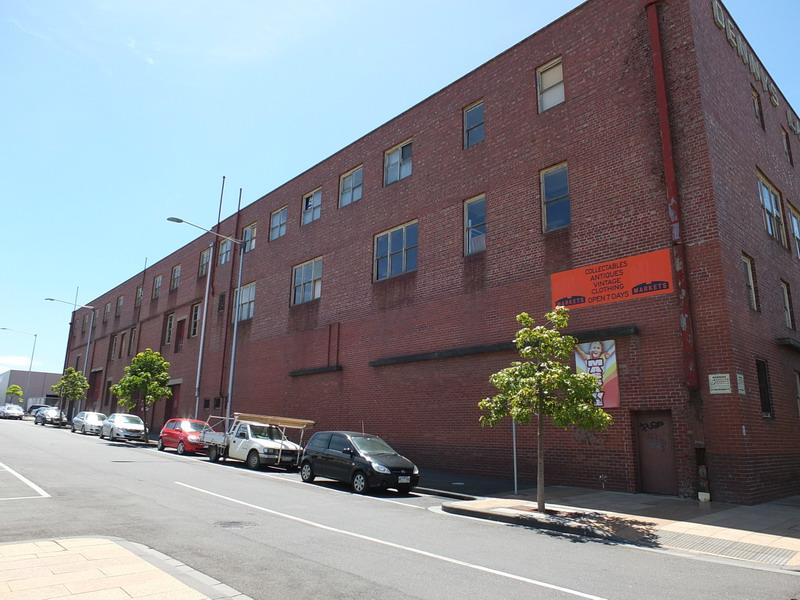 Photo 4. Former woolstore, south elevation looking west, 20 Brougham St, 2015.