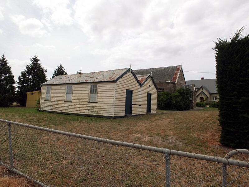 Photo 4: Former Sunday School (middle ground) &amp; Church (background), south elevations, 2016.