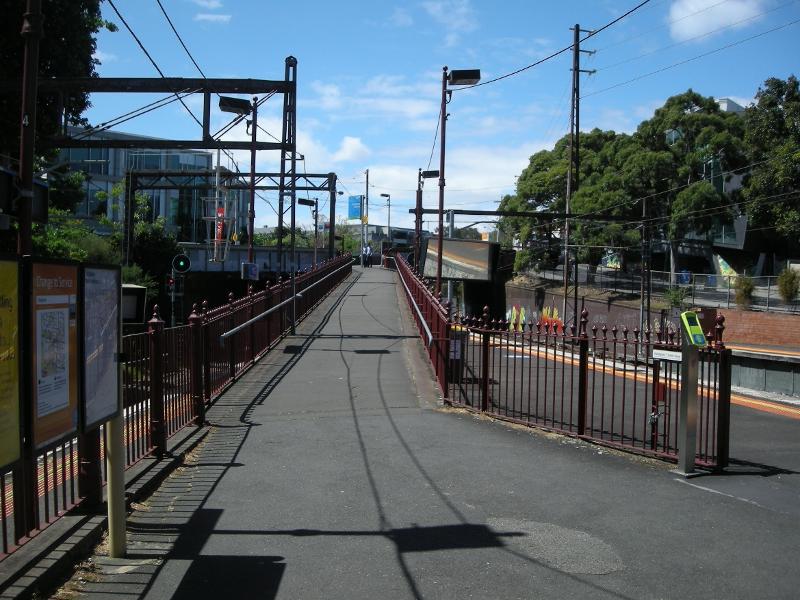 Looking north and upwards along the pedestrian walkway which links the island Platforms 2 and 3 with the south-side footpath on Burwood Rd bridge