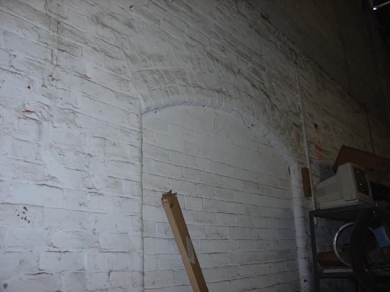 Segmental arched opening in south wall