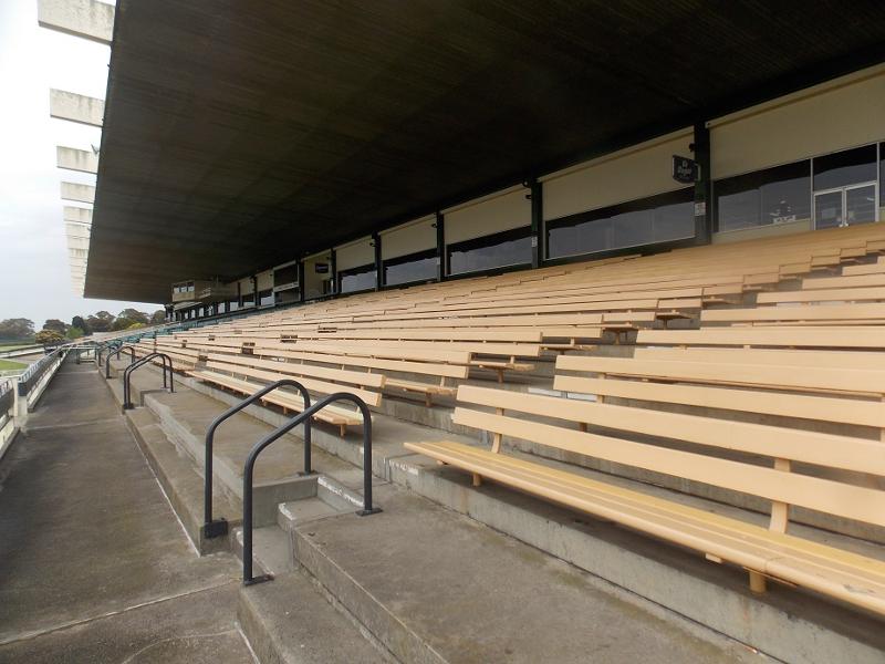 Detail of seating area, showing stepped concrete tier, bench seats and canopy underside.jpg