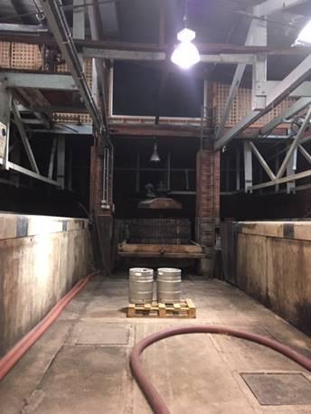 2019 wine press in cellar.jpg