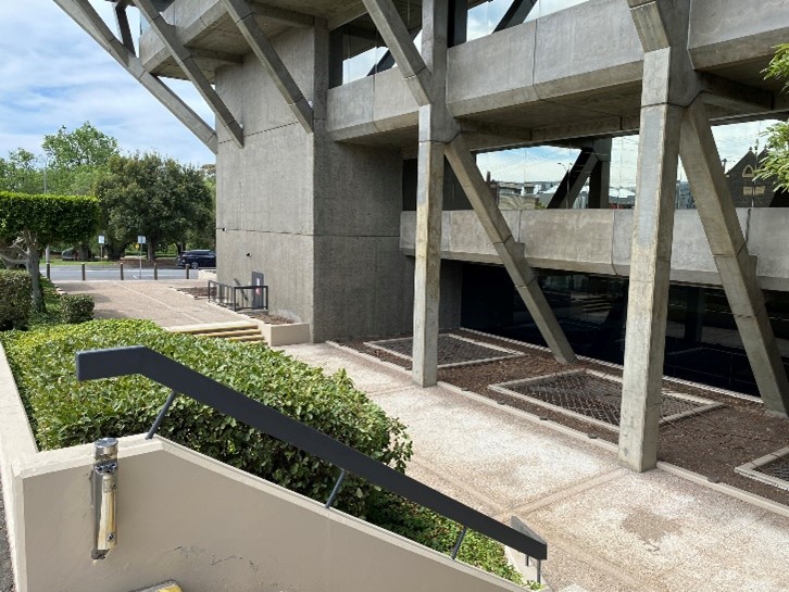 2023 The building is stepped down from Fenwick Street creating a small plaza below